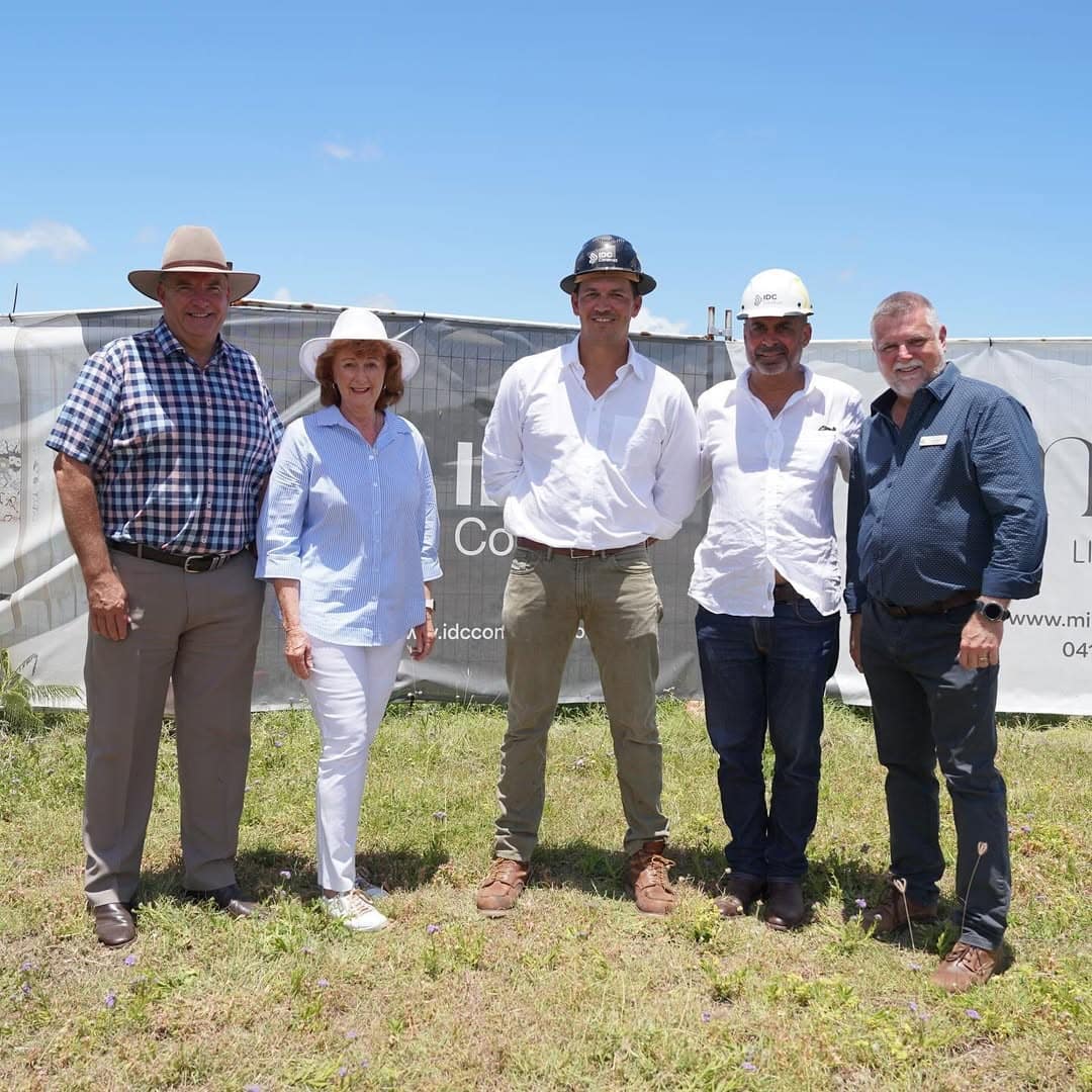 The Mira Living and IDC Construct party gathered in front of the site hoarding at the January 2025 groundbreaking